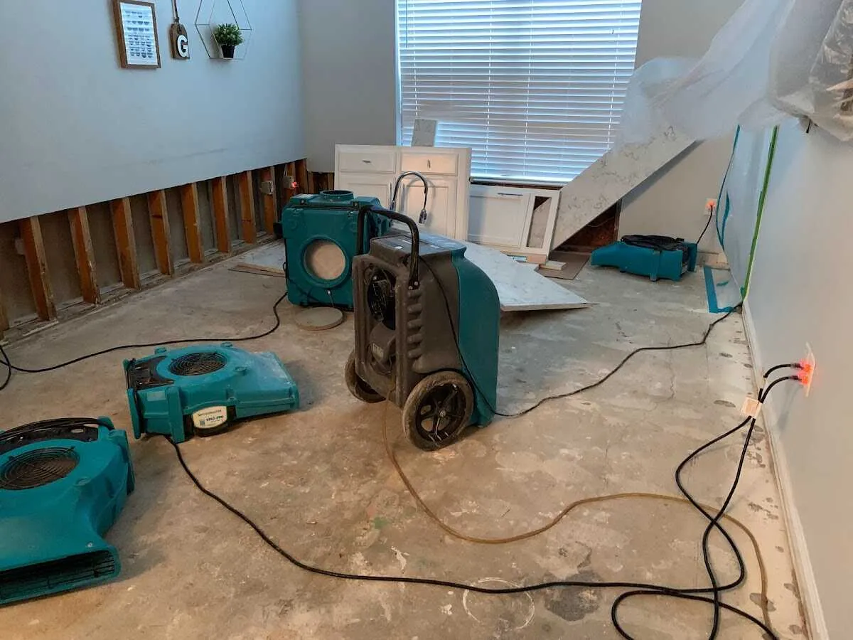 Dehumidifier in flood-cut room for Water Damage Restoration in Youngsville