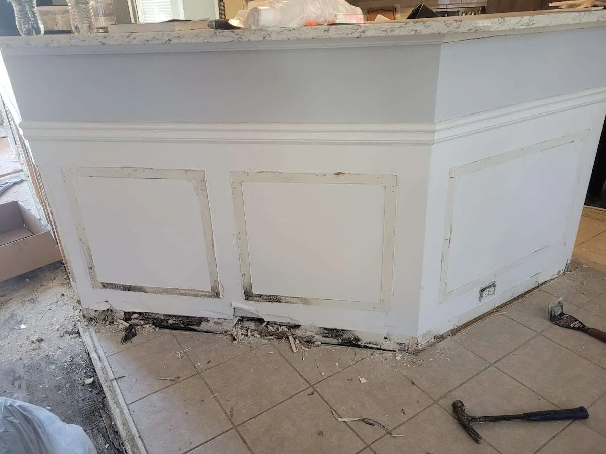 Water damage and mold on kitchen during Storm Damage Restoration in Youngsville